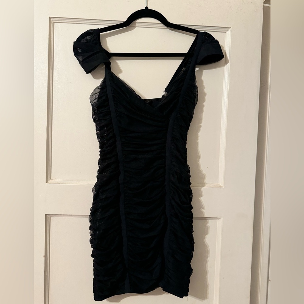 Black form fitting cocktail dress